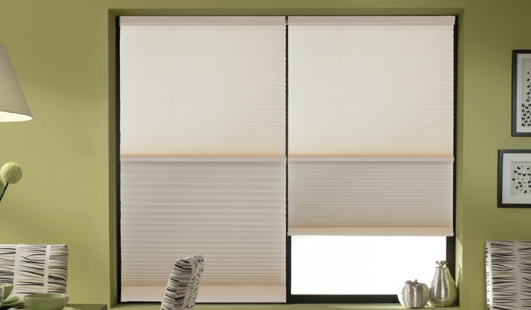 Cellular shades are offered in many colors and patterns. Cellular shades by in a Austin dining room.
