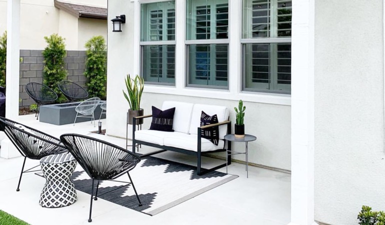 Spending a few hours weeding and mulching can help give you a backyard oasis. An outdoor with plantation window treatments