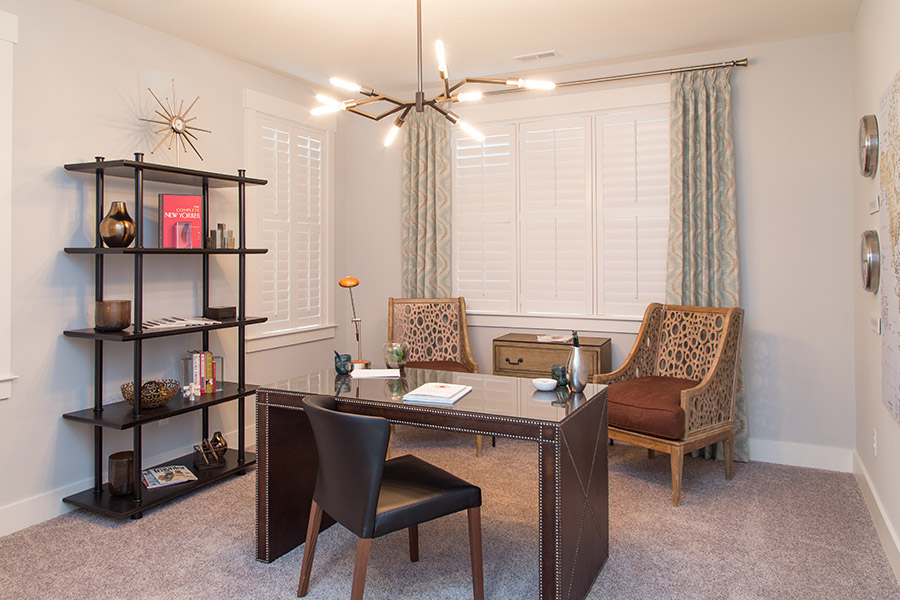 White Polywood shutters within an office.