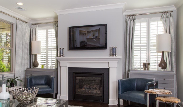 With the proper arrangements, your fireplace can run its best this winter. Austin mantle with white shutters.
