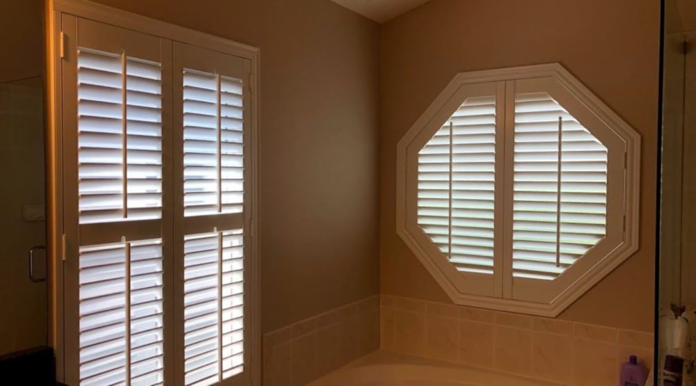 Octagon window treatments Octagon window in a Austin bathroom