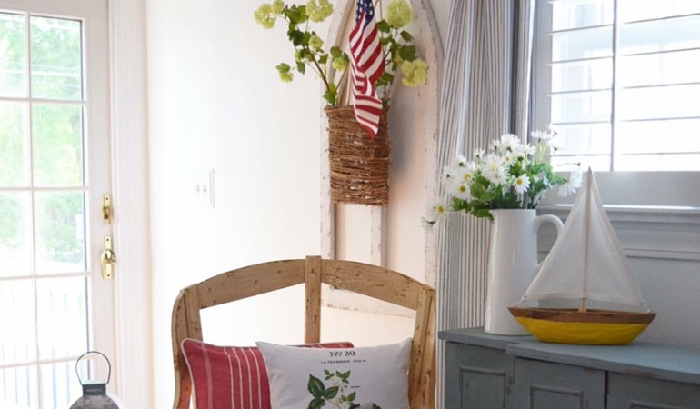 Bright sitting corner with faux wood plantation shutters in Austin. Faux wood plantation shutters in Austin