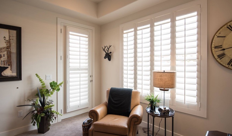 Polywood® plantation shutters are of custom-made craftsmanship.  Plantation shutters in a corner