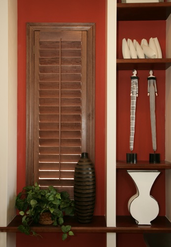 You can even match your wood shutters with shelving. Austin wood shutter shelving