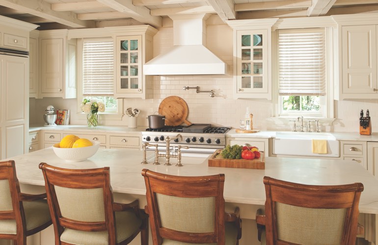 Kitchen Blinds In Austin, TX Blinds covering the windows of a modern kitchen