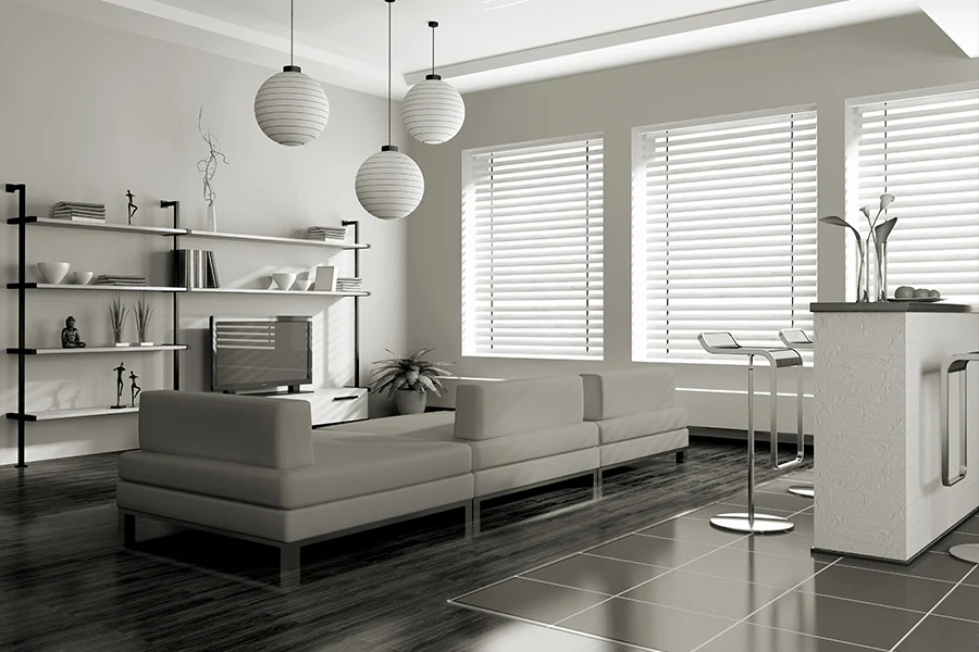 White blinds on windows in a white living room